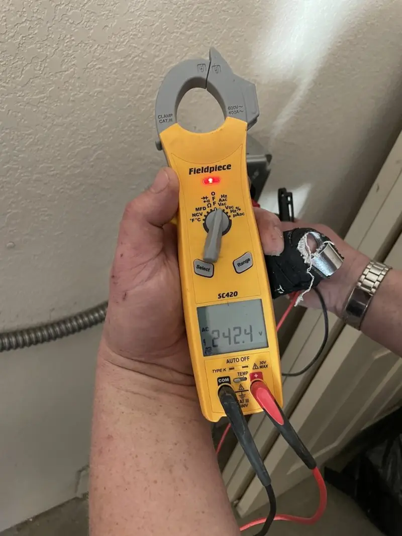 Voltage testing with clamp meter during Outlet Installation in Mabank